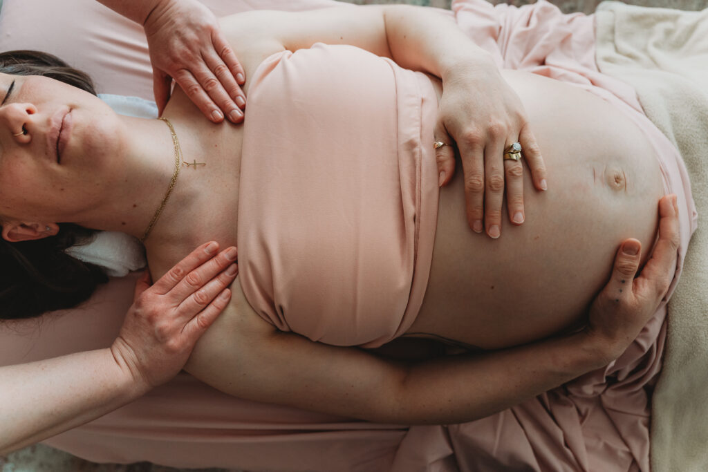 image of a pregnant woman getting a massage